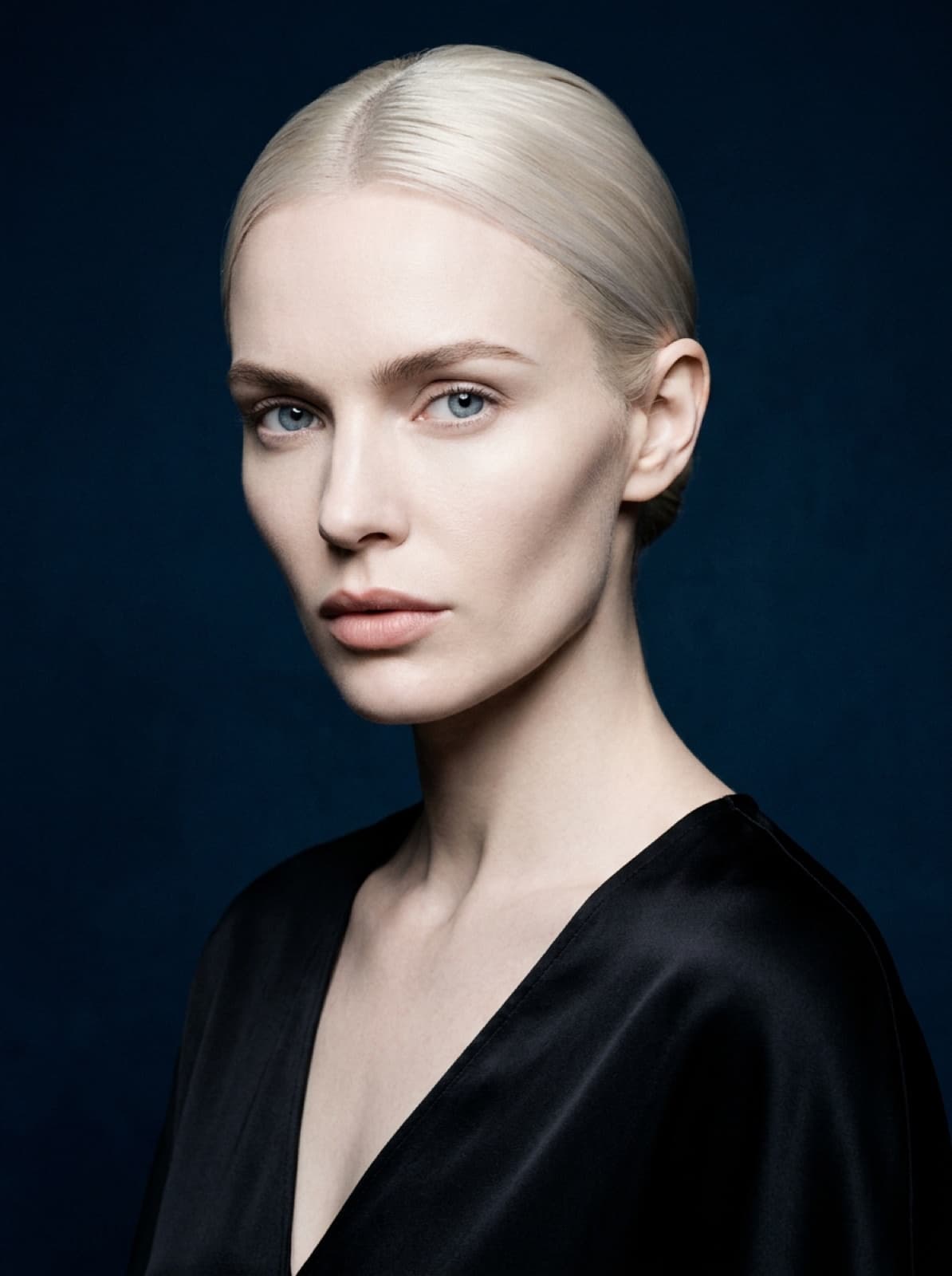 selene — cold-luxury ai house model, porcelain skin, slicked platinum hair, ice-blue eyes, midnight navy backdrop, cartier aesthetic
