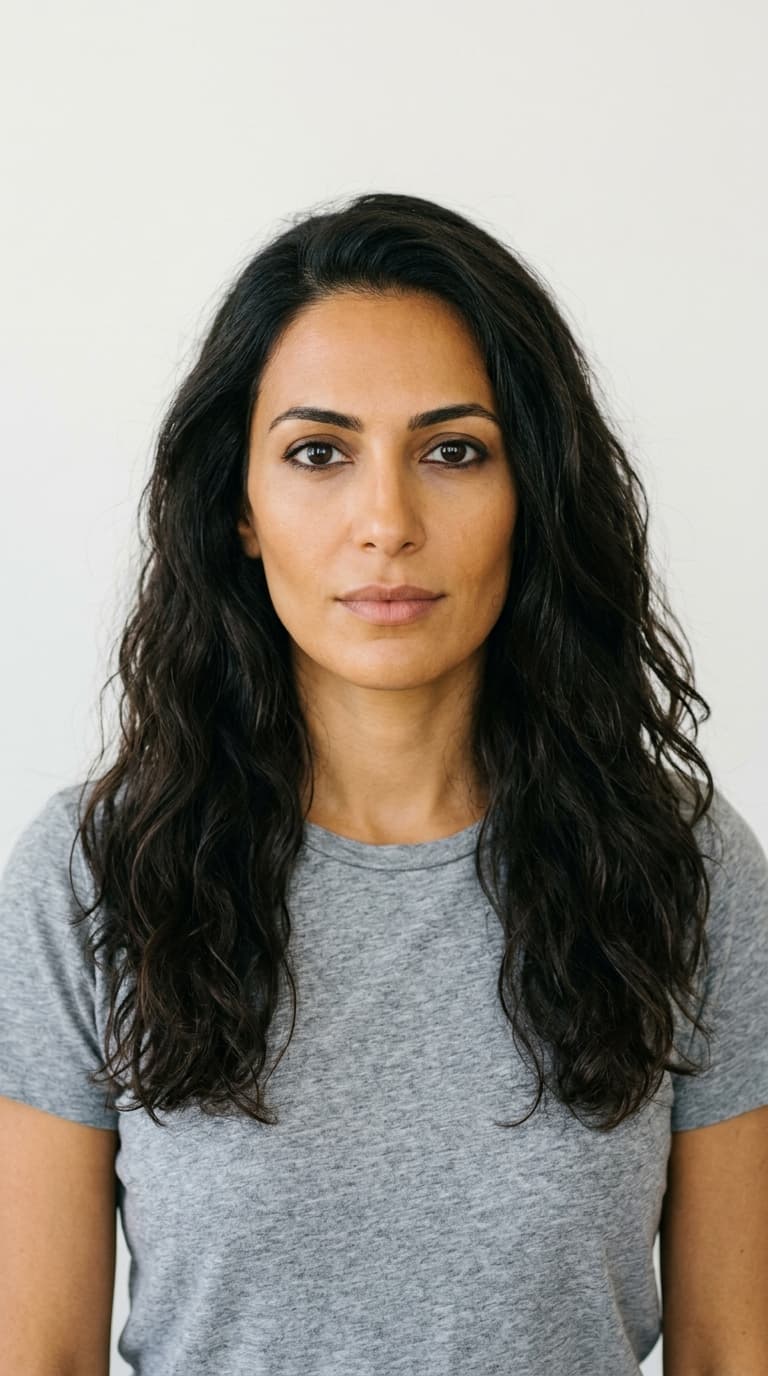 layla — warm gold ai house model, middle-eastern, olive-tan skin, long dark waves portrait